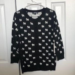 Never worn, button-up cardigan.